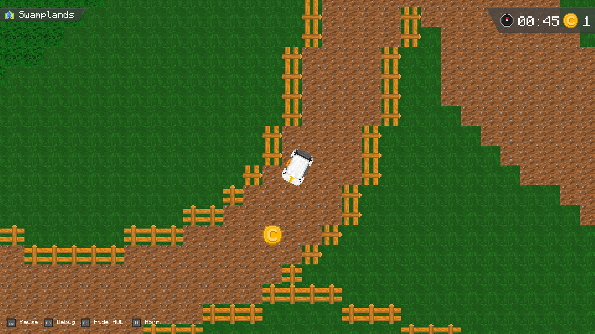 A screenshot showing the game in the Golf Cart Time Trial mode, showing the second coin in the Swamplands track, the first coin has already been collected as shown in the HUD, the second coin is located in a tight corner with there being fences on both sides.